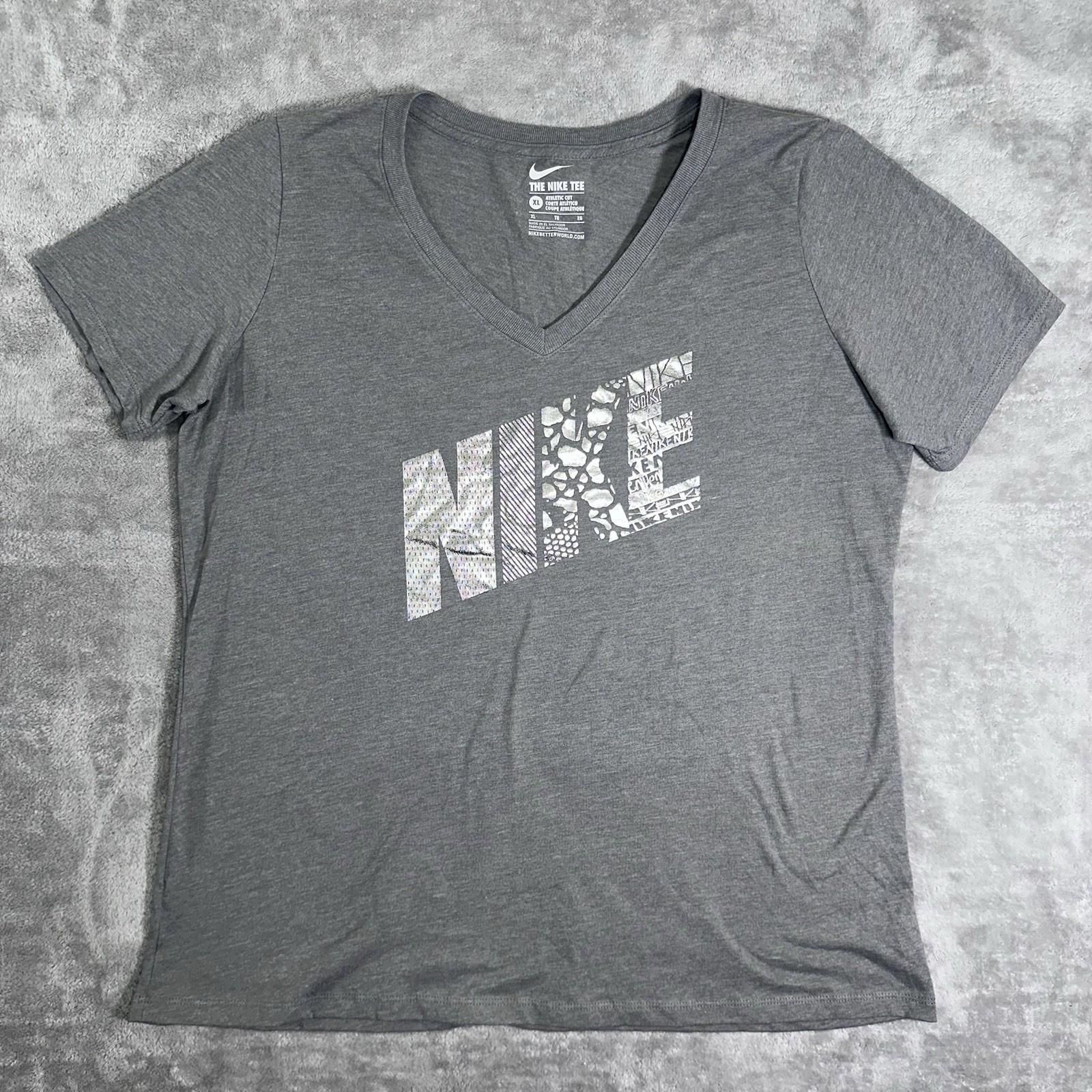 The Nike Tee Athletic Cut T-shirt Silver Metallic Logo XL Women’s Color Gray