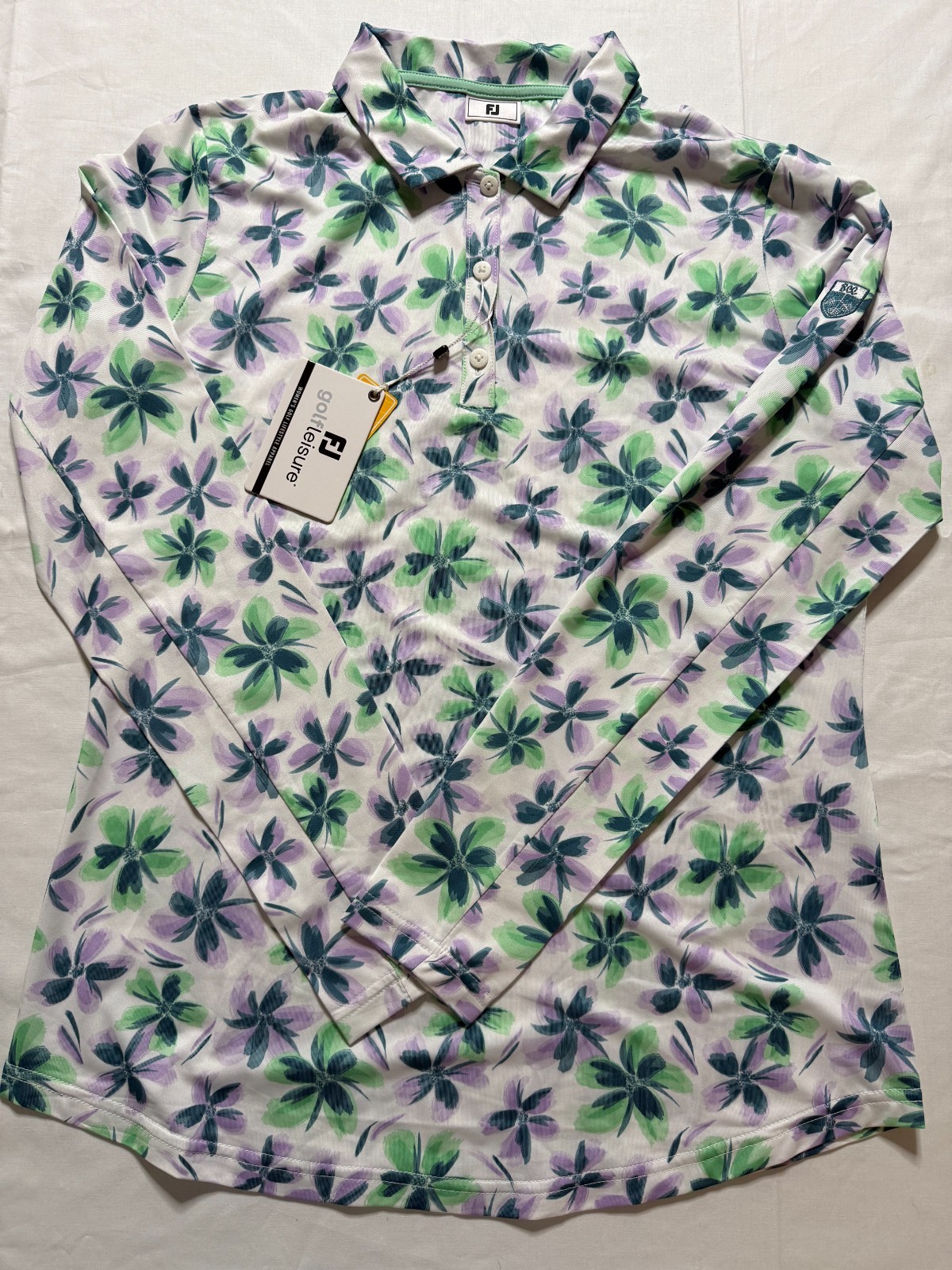 NWT WOMEN’S FOOTJOY LS GOLF SHIRT – SIZE: MEDIUM – WHITE W/ MULTI FLORAL (M5.1)