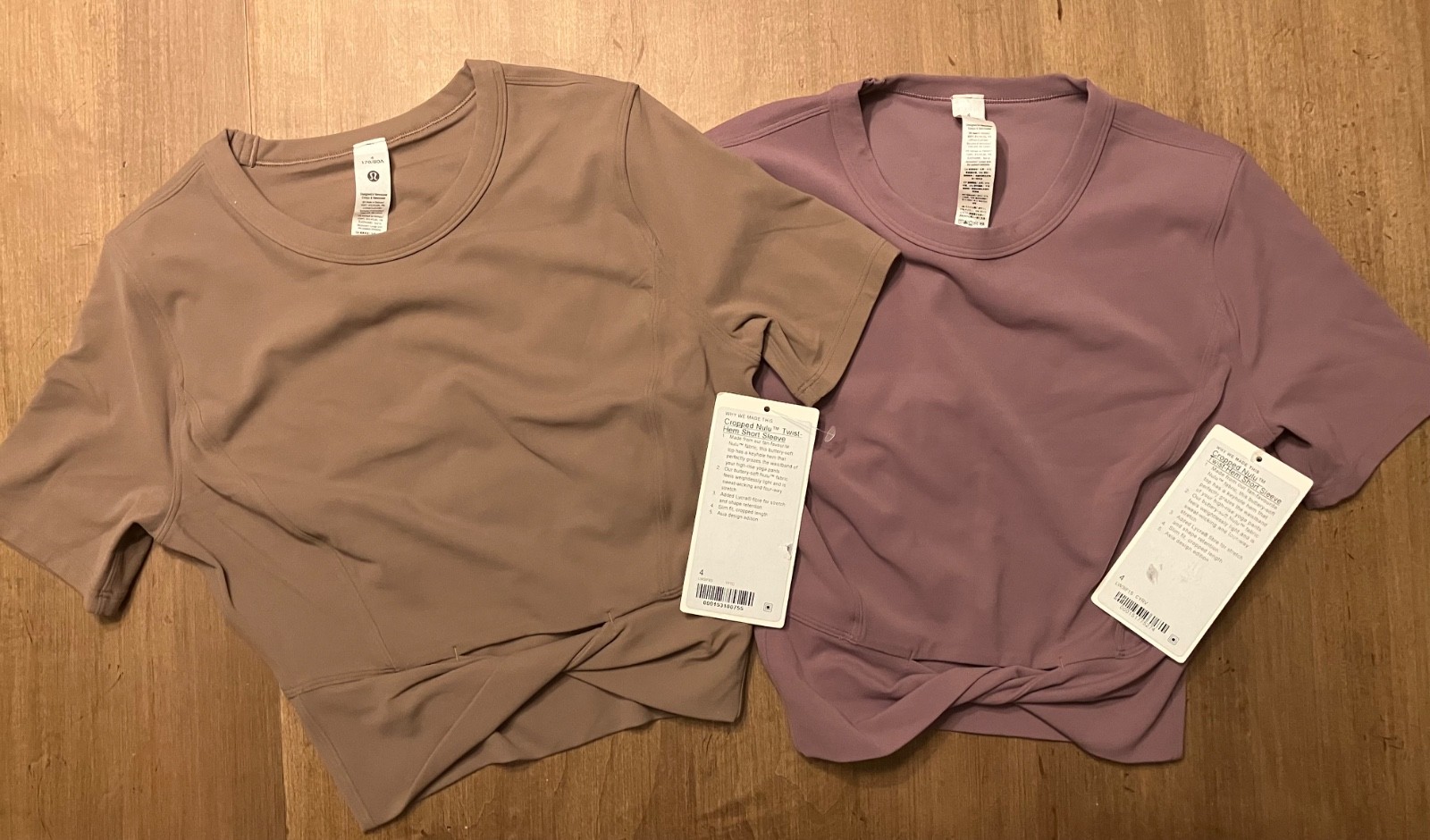 Two (2) Lululemon Cropped Nulu Twist Hem Short Sleeve Size 4 New