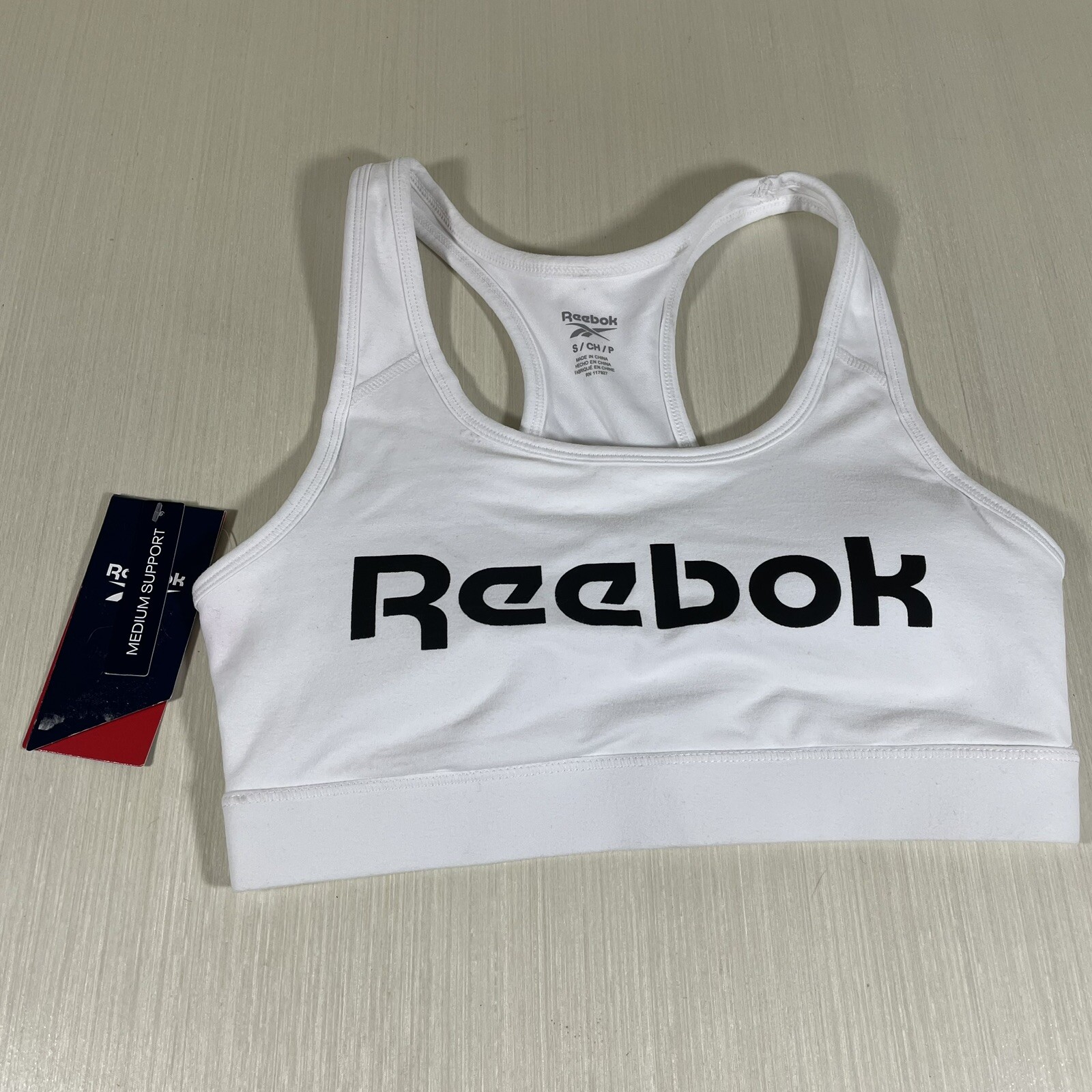 Reebok Women’s Sports Bra Size Small, Medium Support Stark White POP NWT