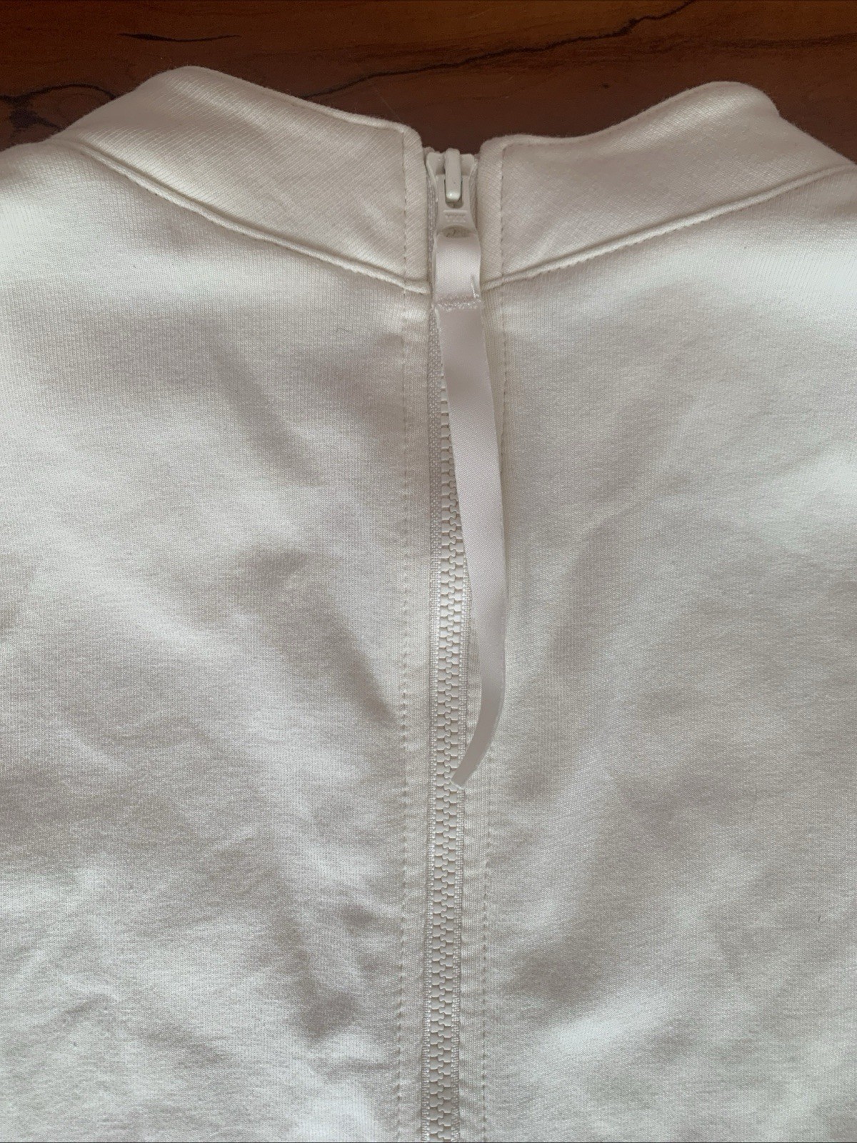 NWT Reebok Classic Womens Size Medium DC Bodysuit Cream With Black Accents