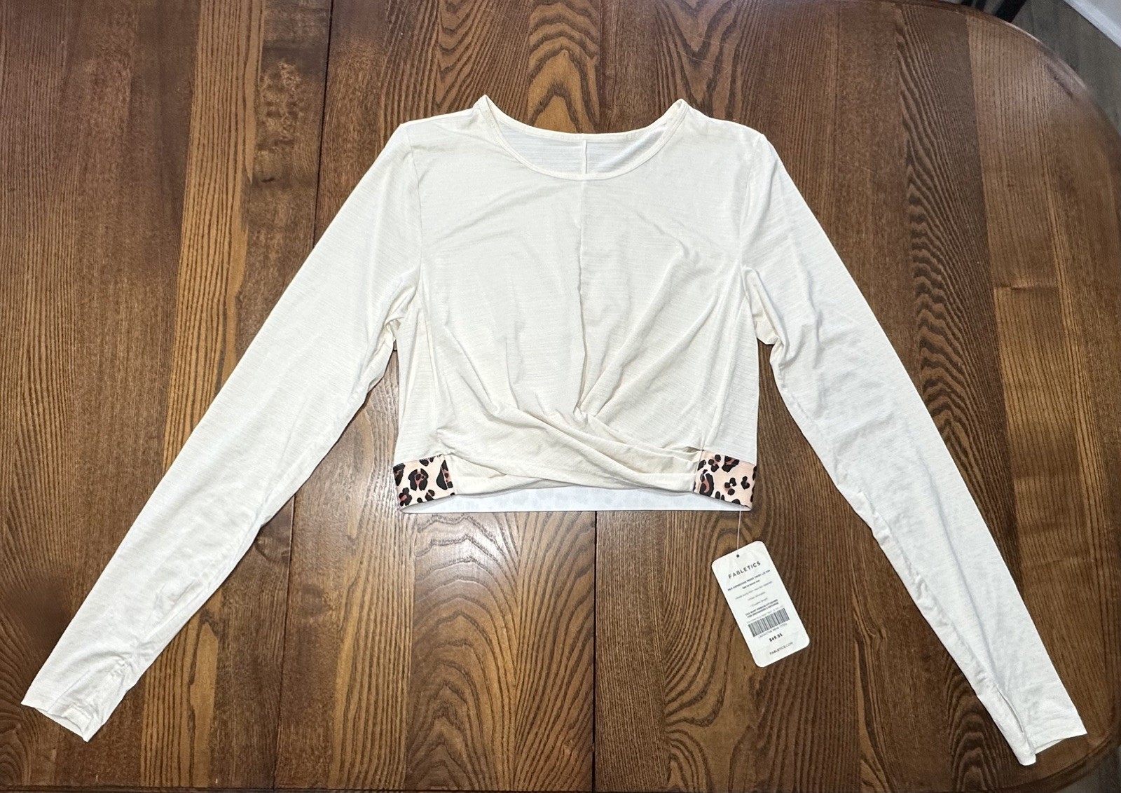 NWT Fabletics Ivory & Animal Print Front Twisted Cropped Top Long Sleeve Size L