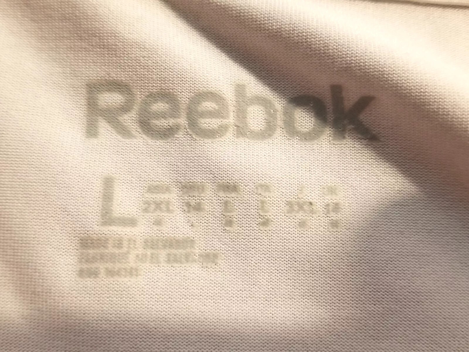 REEBOK SpeedWick Size Large White Active Wear V Neck Short Sleeve Women’s Top