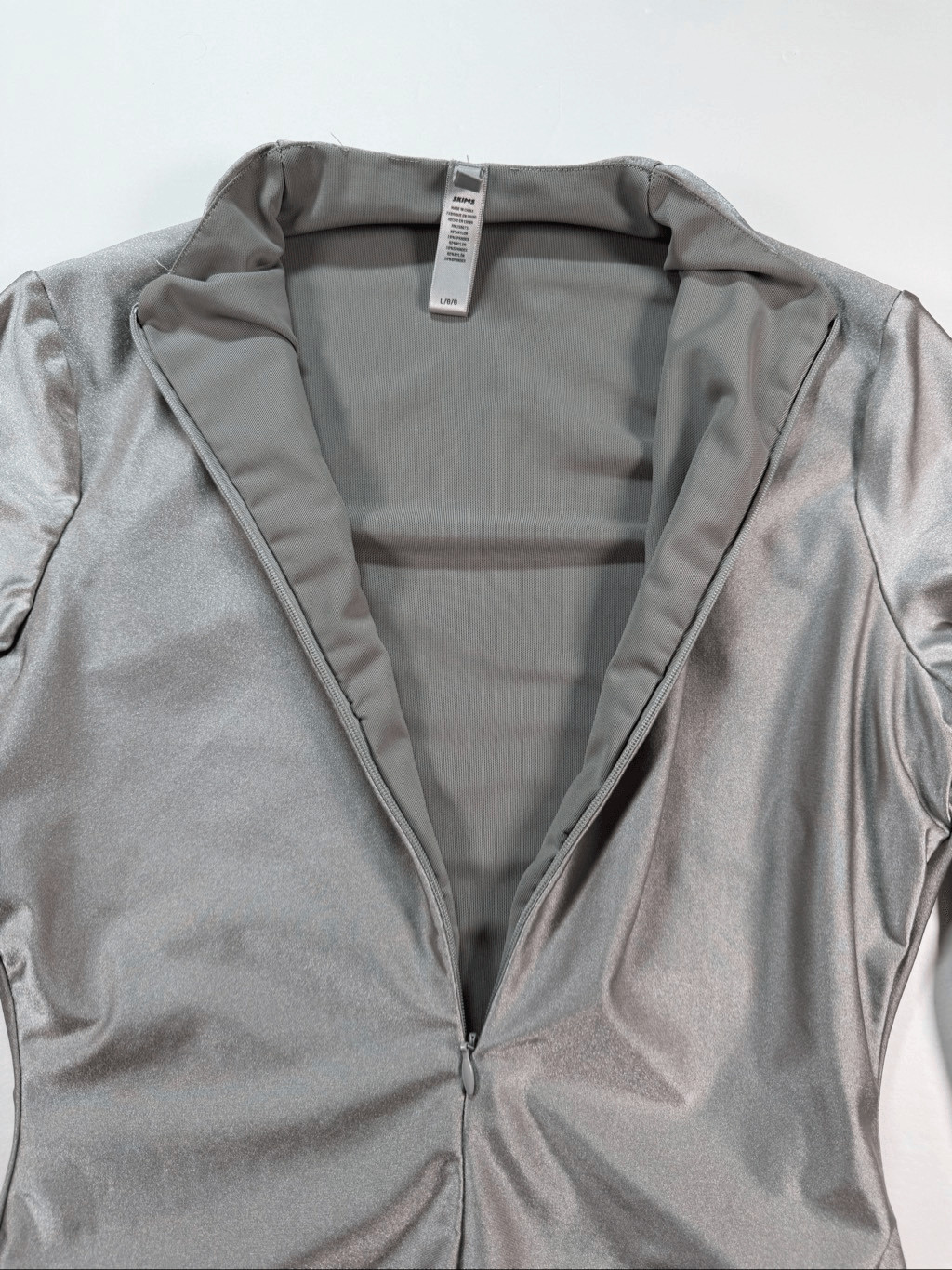 SKIMS Shine Zip Front Long Sleeve Bodysuit Gray Silver Metallic Size Large