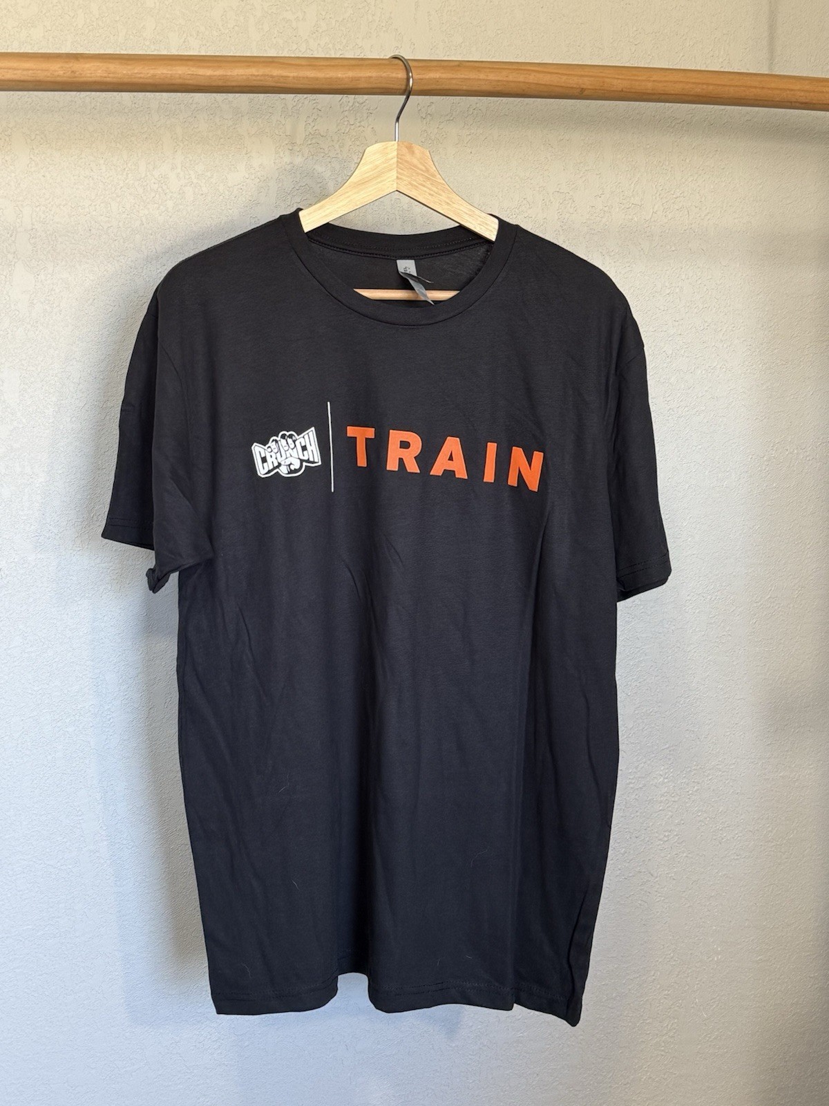 Crunch Fitness “TRAIN” Graphic Tee- Orange/Black – Next Level Apparel