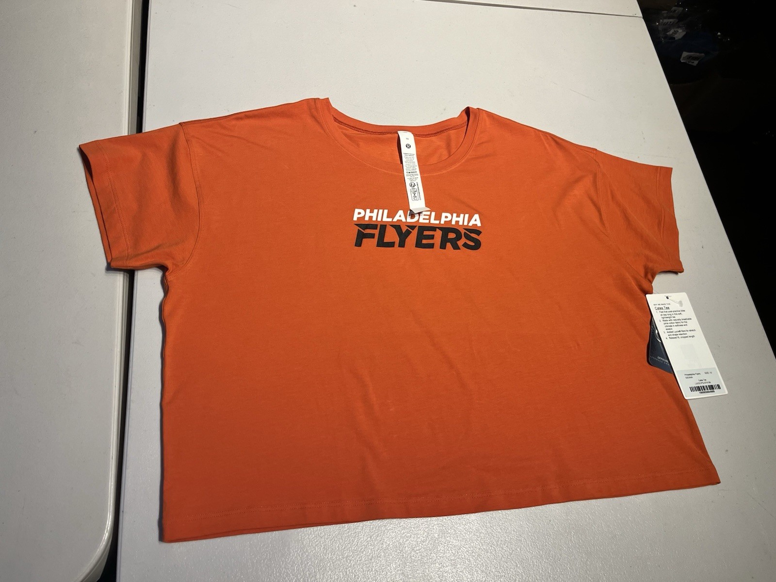 Lululemon Top Women’s 10 Orange Cates Tee Shirt NHL Hockey Yoga Cotton Boxy