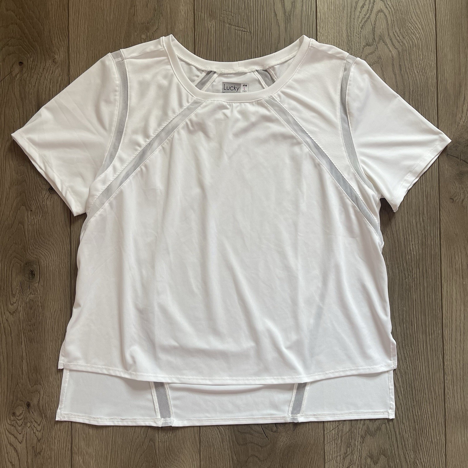 Lucky in Love Women’s Large 12 Core Mixed Up High Low White Tennis Top