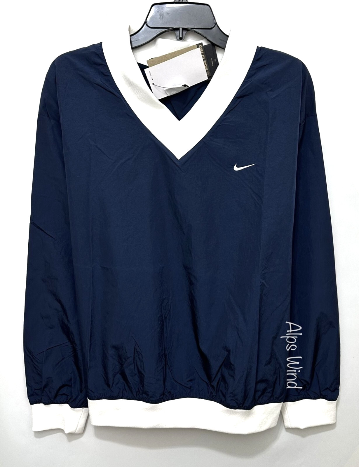 Nike Sportswear Essential Women’s Loose UV Woven Long-Sleeve V-Neck Top SZ.M NWT