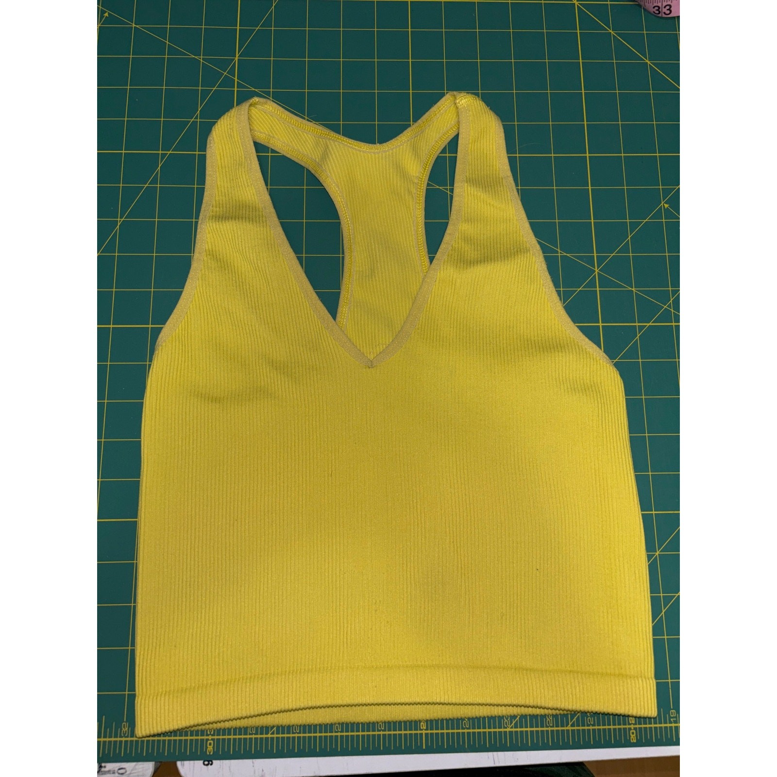This is an FP Movement ribbed racerback crop tank/sports bra