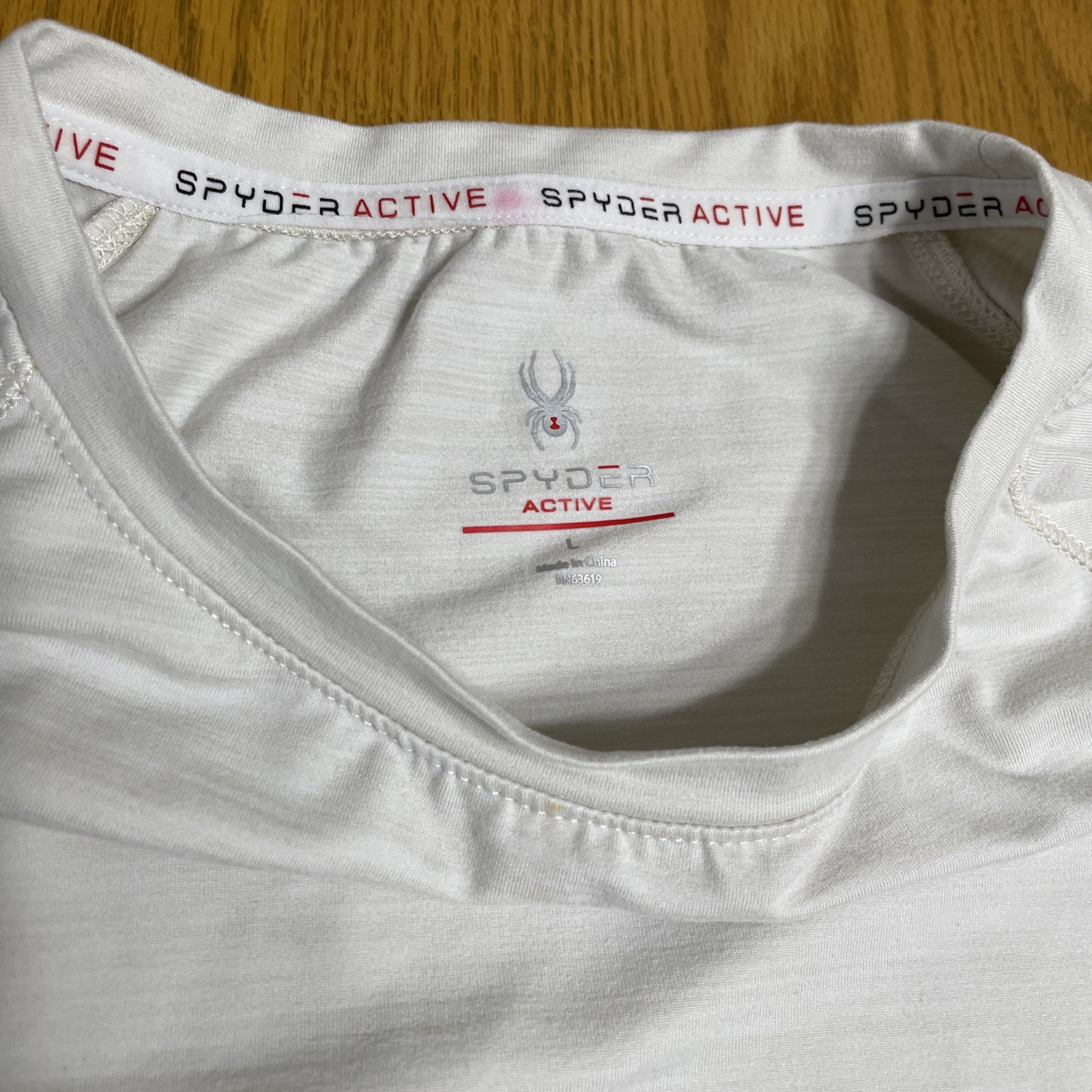Spider Active Size L Sports Top Beige Short Sleeve Stretch Side Key Money Pocket