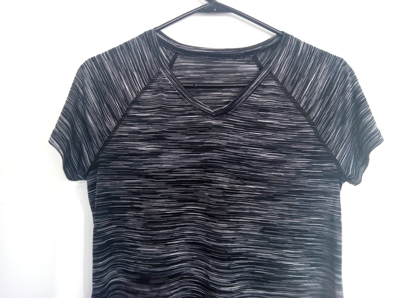 Size S performance top in black, white and gray. Vneck. Excellent condition