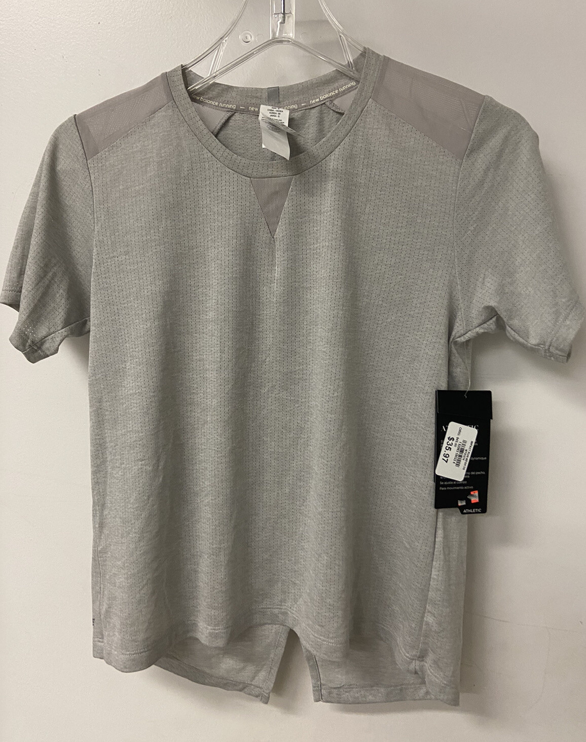 NEW BALANCE size XS short-sleeve ventilated lightweight wicking running shirt