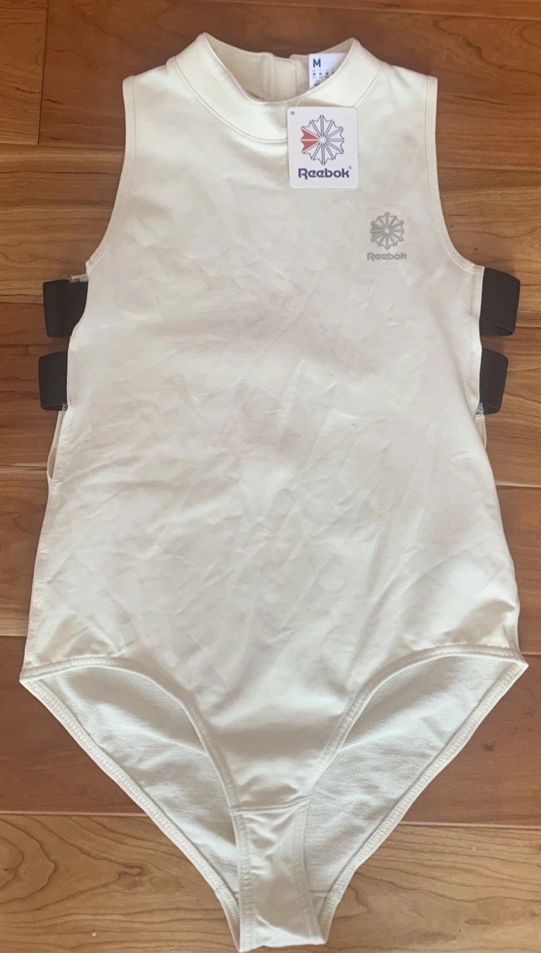 NWT Reebok Classic Womens Size Medium DC Bodysuit Cream With Black Accents