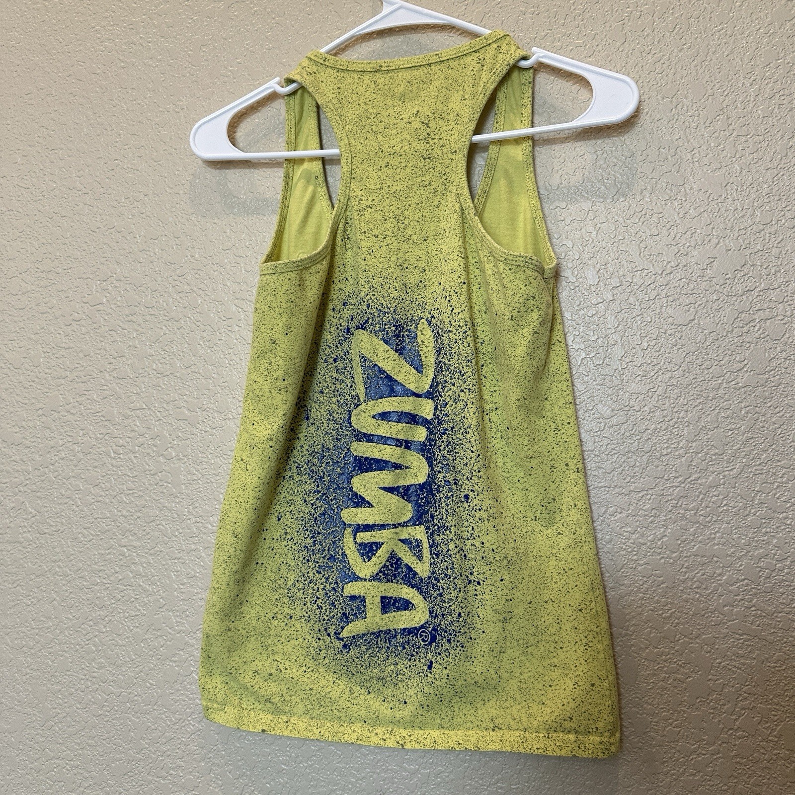 Zumba Wear Top Woman’s Size large Yellow Blue Racerback Tank Zumba Spray Accent